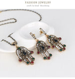 Turkish Style Hand of Fatima necklace and earrings set with green  stones